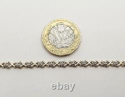 0.15ct Diamond Line Crisscross Bracelet 7.15 / 18.5cm 9ct Yellow Gold 4.8g