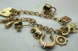 1970's Vintage 9 carat Gold Charm Bracelet With Nine Charms