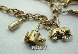 1970's Vintage 9 carat Gold Charm Bracelet With Nine Charms