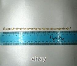 19cm (7 1/2'') 9ct Gold Diamond Cut Flower Link Bracelet 2.4g