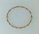 375 9ct Yellow, & White Gold Twisted Bangle Fully Hallmarked
