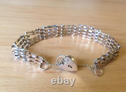 9CT GOLD BAR GATE BRACELET WITH HEART LOCK 7.5g