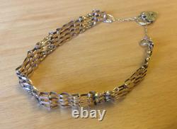 9CT GOLD BAR GATE BRACELET WITH HEART LOCK 7.5g