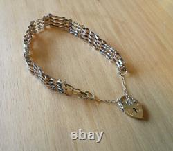 9CT GOLD BAR GATE BRACELET WITH HEART LOCK 7.5g