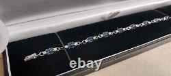 9CT white gold, Blue stone and diamond bracelet with box