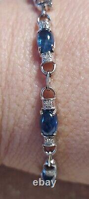 9CT white gold, Blue stone and diamond bracelet with box