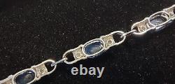 9CT white gold, Blue stone and diamond bracelet with box