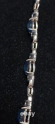 9CT white gold, Blue stone and diamond bracelet with box
