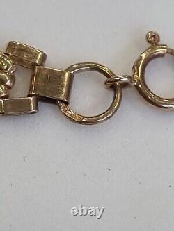 (9) 9ct/ 375 Garnet Gate Bracelet 7 Inch 5.77 Grams
