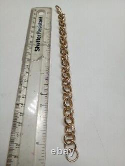 9 carat yellow gold hallmarked heavy belcher link bracelet, weighing 25gms