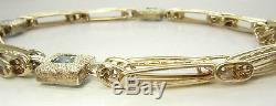 9ct (375,9K) Yellow Gold Ladies Gate Link Topaz Bracelet With Heart Lock