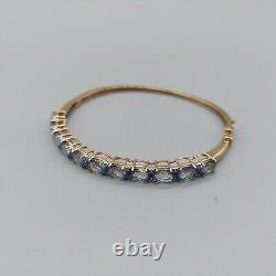 9ct 375 Gold Bangle with 11 Blue Stones, London Assay, BJB, 11g, 6.5cm Wide