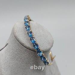 9ct 375 Gold Bangle with 11 Blue Stones, London Assay, BJB, 11g, 6.5cm Wide