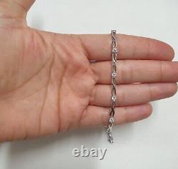 9ct 375 White Gold Infinity CZ Link Bracelet