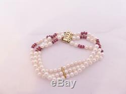 9ct/ 9k gold Diamond clasped three strand cultured Pearl & Ruby bracelet, 375