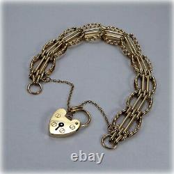 9ct Gold 7.5 Fancy Four-Bar-Gate Bracelet, with Heart Padlock