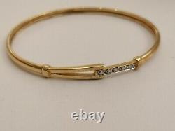 9ct Gold Bangle With Clear Stones fully hallmarked