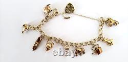 9ct Gold Charm Bracelet 9 charms