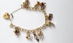 9ct Gold Charm Bracelet 9 charms