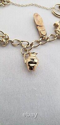 9ct Gold Charm Bracelet 9 charms