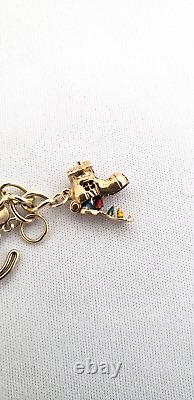 9ct Gold Charm Bracelet 9 charms