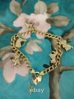 9ct Gold Charm Bracelet With 5 Charms Weighs 5.7g