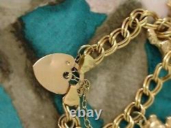 9ct Gold Charm Bracelet With 5 Charms Weighs 5.7g