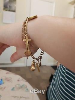 9ct Gold Charm Bracelet With Lots Of Charms. See Pics