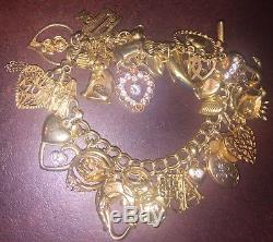 9ct Gold Charm Bracelet With Over 30 Charms 43.5g
