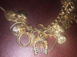 9ct Gold Charm Bracelet With Over 30 Charms 43.5g