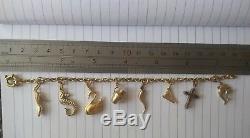 9ct Gold Charm Bracelet with 8 Charms, Hallmarked + 5, 9ct Gold Split Rings