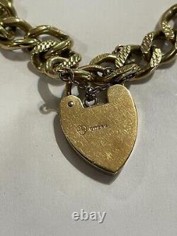 9ct Gold Heavy embossed link charm bracelet with safety chain and padlock 25.8g