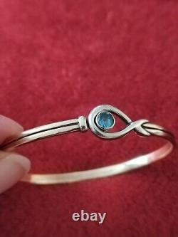 9ct Gold Hook Bracelet With Blue Topaz And White Gold