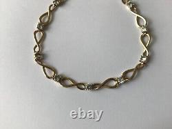 9ct Gold Infinity Links Bracelet with Clear Stone