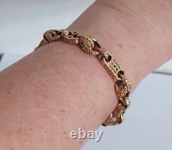 9ct Gold Stars, Bars and Tulip link bracelet, ref 14823