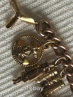 9ct Gold charm bracelet with unique charms 33.7grams