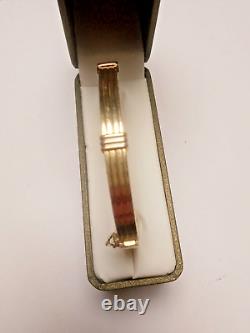 9ct Gold ladies gold bangle 2 tone Pre owned Weight 14.6 grams Fit up to a 6 ½