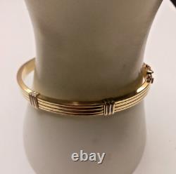 9ct Gold ladies gold bangle 2 tone Pre owned Weight 14.6 grams Fit up to a 6 ½