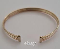 9ct Gold multi tone gold torque bangle. 6.1 grams