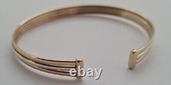 9ct Gold multi tone gold torque bangle. 6.1 grams