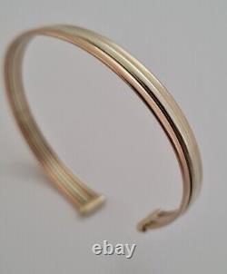 9ct Gold multi tone gold torque bangle. 6.1 grams