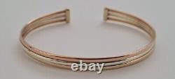 9ct Gold multi tone gold torque bangle. 6.1 grams