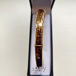 9ct Rose Gold buckle hinged bangle hallmarked Chester 1914 8.4 grams with safety