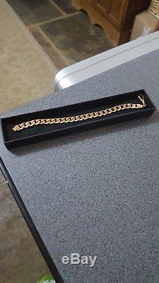 9ct SOLID GOLD CURB STYLE BRACELET 19.5 GRAMS. 9MM LINKS