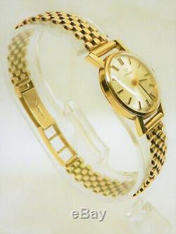 9ct Solid Ladies Gold Omega on Solid 9ct Gold Bracelet