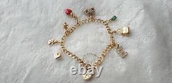 9ct YELLOW GOLD CHARM BRACELET 8 CHARMS STAMPED 375 11.7 g