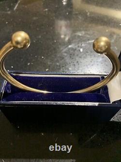 9ct Yellow Gold Ball Tourqe Bangle (solid And Weighs 46.0 Grams)