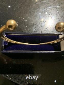 9ct Yellow Gold Ball Tourqe Bangle (solid And Weighs 46.0 Grams)