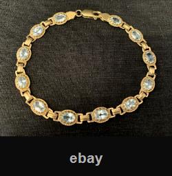 9ct Yellow solid Gold Ladies Blue Topaz Bracelet highly decorative 7 1/2