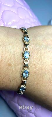 9ct Yellow solid Gold Ladies Blue Topaz Bracelet highly decorative 7 1/2